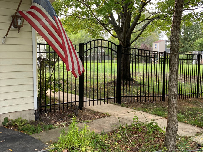 Black aluminum fence installed in Chicagoland